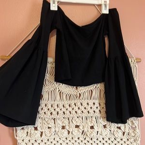 Bell sleeve black crop top.
